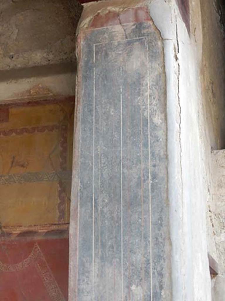 VI.16.15 Pompeii. May 2015. Room F, detail of pilaster on west side. Photo courtesy of Buzz Ferebee.
