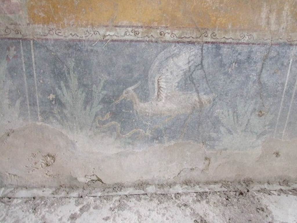 VI.16.15 Pompeii. December 2006. West wall of room F with painting of bird and plants.