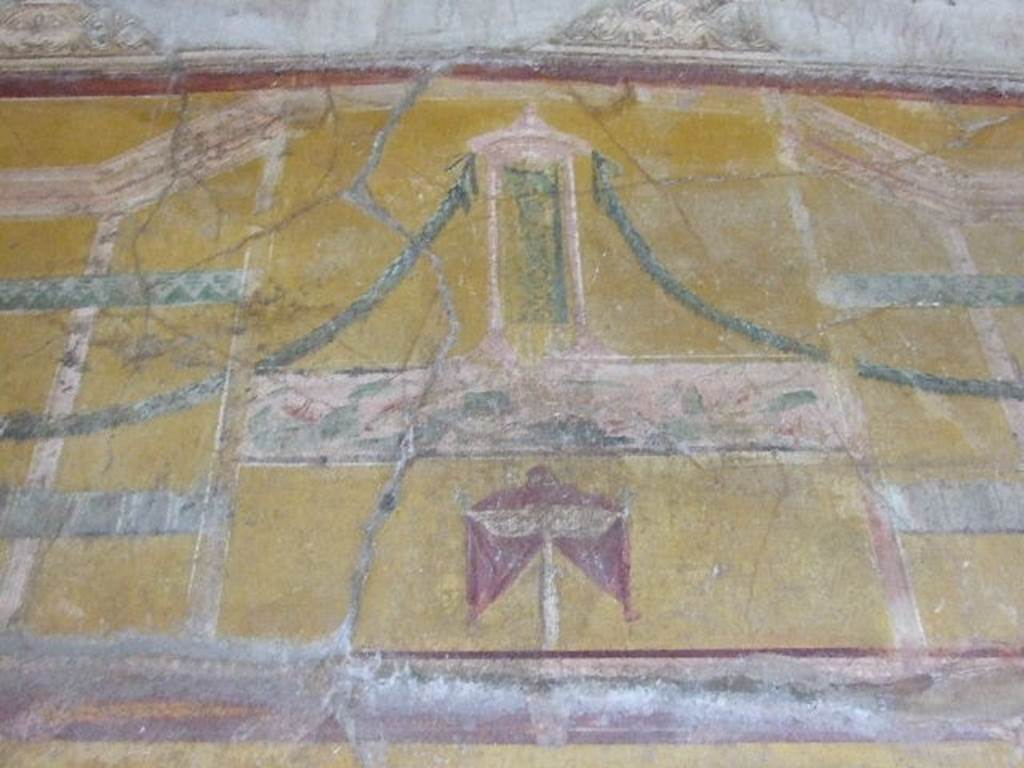 VI.16.15 Pompeii. December 2006. Upper centre of west wall of room F with detail of wall decoration.