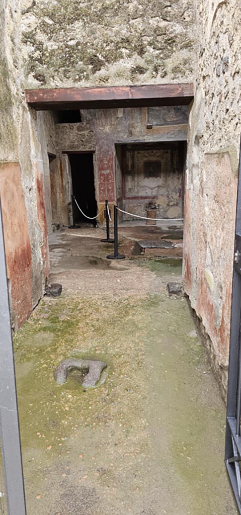 VI.16.15 Pompeii. December 2023.
Looking west towards flooring of entrance corridor/fauces. 
Photo courtesy of Miriam Colomer.