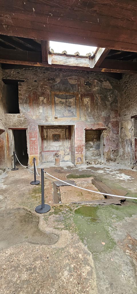 VI.16.15 Pompeii. December 2023. 
Looking west across atrium flooring towards impluvium.
Photo courtesy of Miriam Colomer.