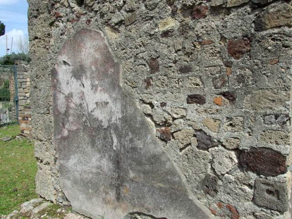 VI.16.27 Pompeii. March 2009. Room L, east wall of tablinum, looking north-east. Nearly all faded was a small landscape that probably would have been seen in the centre of the red panel at the left end of the east wall. The yellow panel in the centre was missing almost entirely, as also the red panel on the right end of this wall. This was mainly missing because of the area used by the doorway into room K. See Notizie degli Scavi, 1908, (p.189)