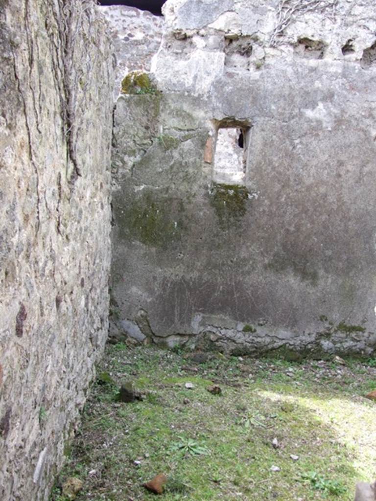 VI.16.27 Pompeii. March 2009. Room Y, south-west corner with window in west wall.
According to NdS, room Y was another rustic narrow room.