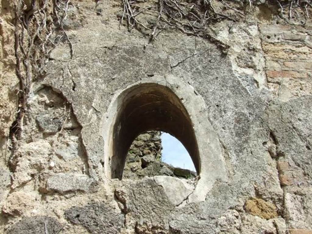 VI.16.28 Pompeii. March 2009. Room C, north-east corner of atrium with remains of niche in east wall. According to NdS, this is described as being in the west wall of the small rustic room at the rear (room G). NdS said - in the west wall was a small window that opened into the atrium. It was in the mode of a rather pyramidal niche. See Notizie degli Scavi, 1908, (p.278)