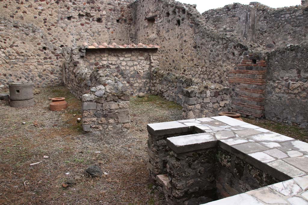 VI.16.40 Pompeii. October 2020. Looking south-east across bar-room towards room D, in centre right. Photo courtesy of Klaus Heese.