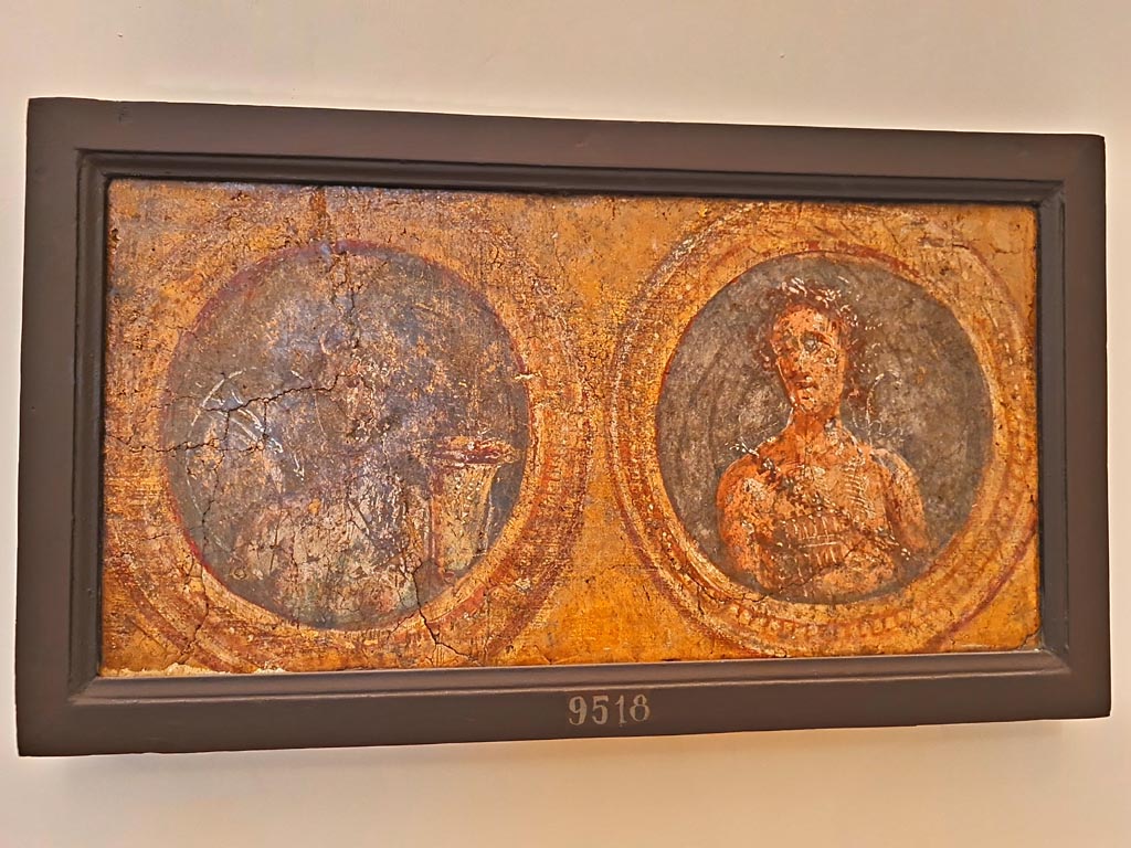 Pompeii Insula Occidentalis. October 2023. 
Two medallions showing personification of Seasons, Summer and Autumn, inv. 9518. Photo courtesy of Giuseppe Ciaramella. 
On display in “L’altra MANN” exhibition, October 2023, at Naples Archaeological Museum.