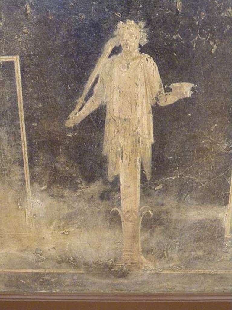 VI.17.25 Pompeii?  Detail of left side herm like satyr holding a cup in the left hand and a stick or staff on the right shoulder. 
From zoccolo painting found on 3rd November 1764.