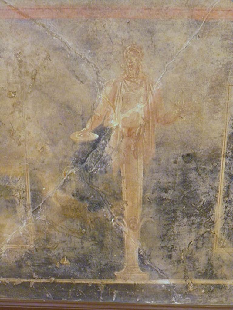 VI.17.25 Pompeii?  Detail of right side herm like satyr holding a patera in the right hand and with a stick on the left shoulder. 
From zoccolo painting found on 3rd November 1764.