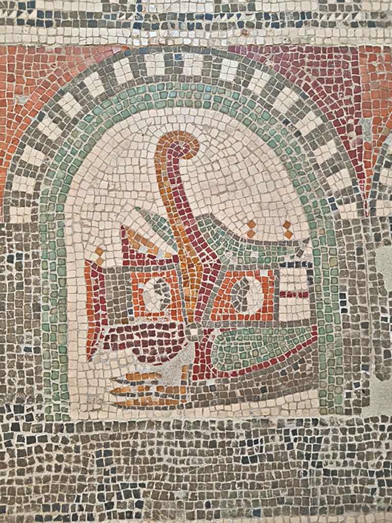VI 17.10 Pompeii ? or Villa of Diomedes ?. June 2024.  
Detail from mosaic of “doors”, showing stern of a ship with rudder. Photo courtesy of Giuseppe Ciaramella. 
On display in Naples Archaeological Museum, Room CXXXIV.