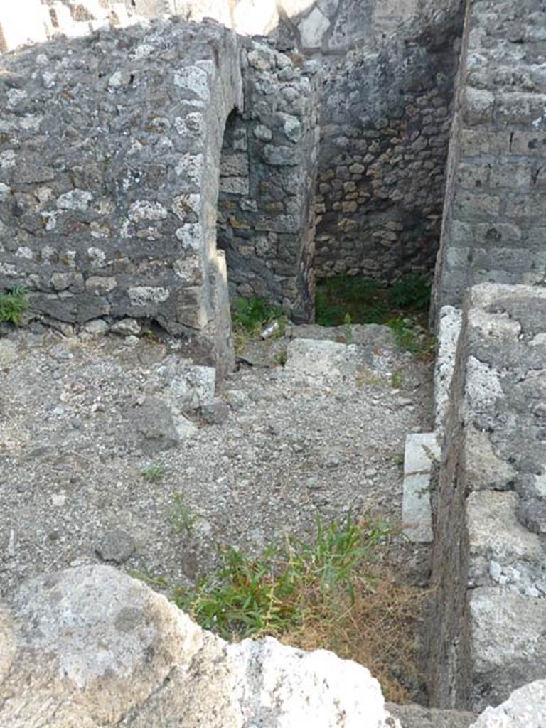VI.17.10 Pompeii. September 2015. Looking south from entrance towards stairs to lower floor, (see VI.17.11).  The doorway on right, would lead to the south-east corner of the atrium.