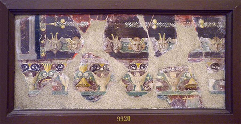VI.17.9-10 Pompeii. Pastiche of fragments of wall painting found 14th August 1778, “from the underground area”.
Now in Naples Archaeological Museum. Inventory number 9920.
According to Aoyagi, etc: 
Stringent similarities also appear with numerous fragments unearthed in the Insula Occidentalis, between 1764 and 1778, assembled in the 18th century in several panels, some of which are published as a vignette in the 4th and the 7th volume of the Antiquities of Herculaneum similar in sophistication and wealth of detail in the decoration in III style of the House of the Golden Bracelet.
(Note 55): Sampaolo, 1998, p.276. no.21 hypothesises that the fragments could have been found in House VI.17.13 since the excavation diaries refer to houses situated inside the Herculaneum Gate (Fiorelli, PAH, 1860, vol. 1, p. 155 and p. 298-99).
However the possibility should not be ruled out, that they could have been found from the House of the Golden Bracelet because the area of VI.17.41, VI.17.42 and VII.16.22, was already the object of Bourbon explorations from 1750. 
See Aoyagi M. and Pappalardo U., 2006. Pompei (Regiones VI-VII) Insula Occidentalis. Napoli: Valtrend. (p.223, and note 55).