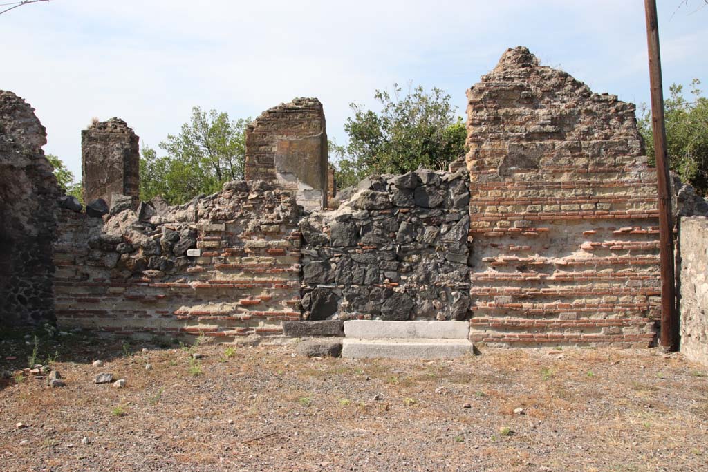 VI.17.32 Pompeii. September 2021. 
Looking west across atrium, towards blocked doorway leading to north-east corner of peristyle. Photo courtesy of Klaus Heese.