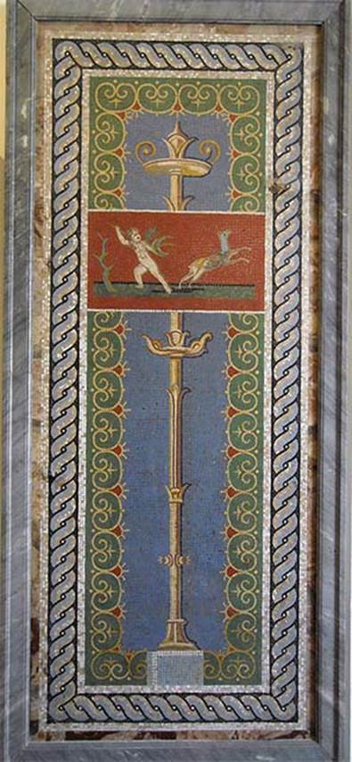 VI.17.36 Pompeii?  One of two panels with candelabra, cupid and deer. 
Now in Naples Archaeological Museum. Inventory number 10013.
The museum card says it was found in VI.17.36. 
According to Prisciandaro and Pagano, it was found on 30th April 1752 in the Villa San Marco at Stabia together with other mosaics.
See Pagano, M. and Prisciandaro, R., 2006. Studio sulle provenienze degli oggetti rinvenuti negli scavi borbonici del regno di Napoli.  Naples: Nicola Longobardi, p. 239.