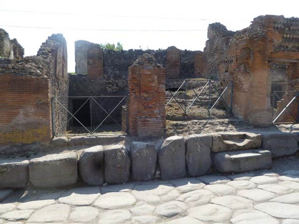 VI.17.37-36 Pompeii. May 2011. Looking west to entrance doorways on Via Consolare.
Photo courtesy of Michael Binns.