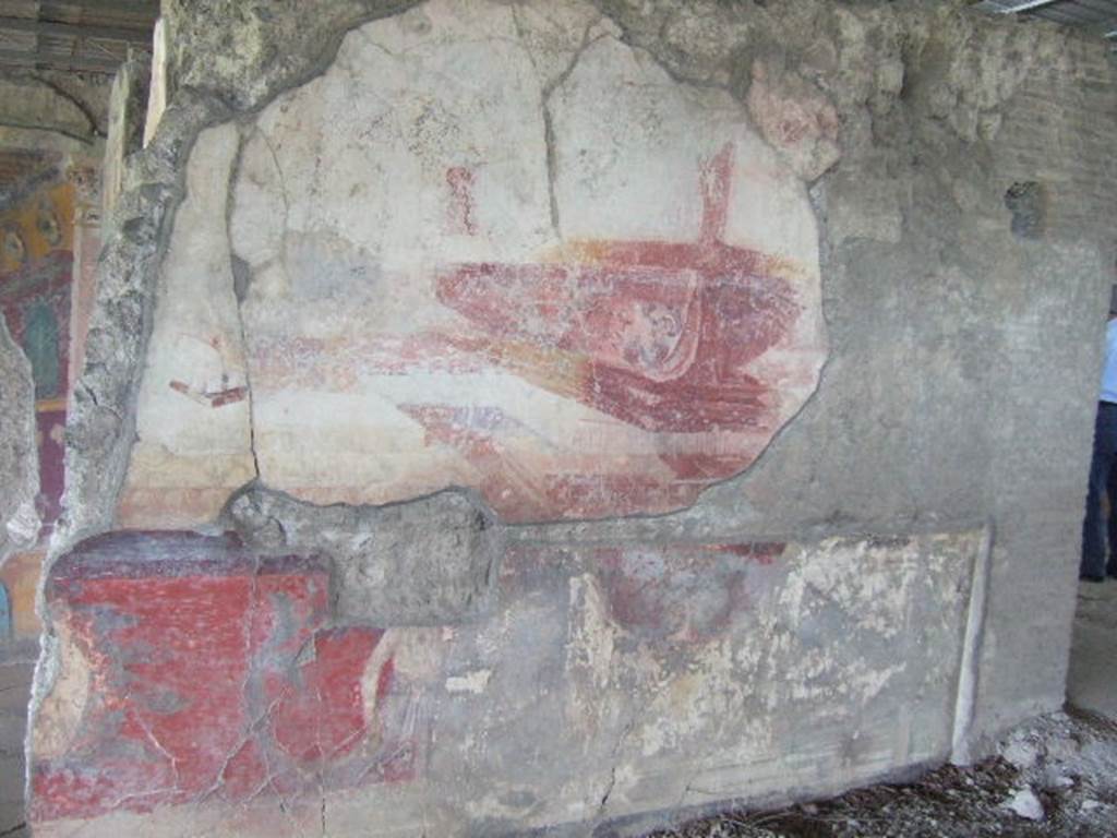 VI.17.41 Pompeii. May 2006. North wall of tablinum with remains of painting of a ship or ships. According to Eleanor Winsor Leach  “above a dado supported by telamones stand the prows of two large ships, each resting on its own rectangular pedestal base”.
See Winsor Leach, E., 2004.  The Social Life of Painting in Ancient Rome and on the Bay of Naples. Cambridge UK: Cambridge UP. (p.69 onwards)