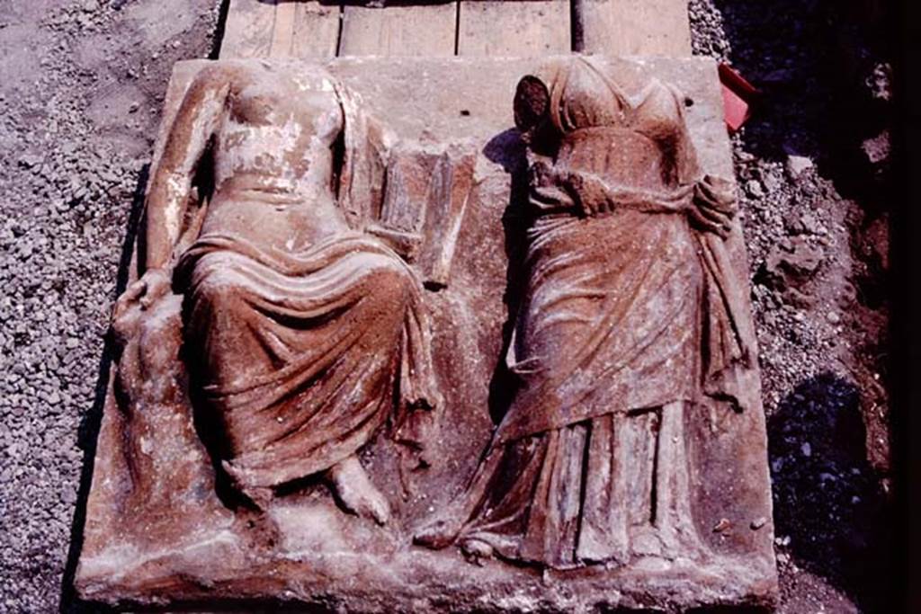 VI.17.42, Pompeii. 1983. Detail of figures on terracotta plaque. Photo by Sally Gladden.    
Source: The Wilhelmina and Stanley A. Jashemski archive in the University of Maryland Library, Special Collections (See collection page) and made available under the Creative Commons Attribution-Non Commercial License v.4. See Licence and use details. J80f0594