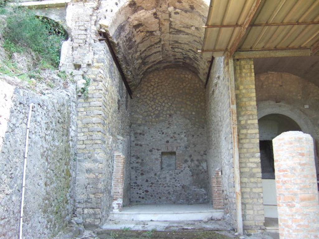 VI.17.42 Pompeii. May 2006. Oecus 32, looking east towards garden diaeta or garden room with high walls and vaulted ceiling. This was decorated on all walls with the famous garden fresco scenes.  Jashemski refers to it as a garden diaeta or garden room. Aoyagi and Pappalardo refer to it as an oecus, and this is the description we use.
See Aoyagi M. and Pappalardo U., 2006. Pompei (Regiones VI-VII) Insula Occidentalis. Napoli: Valtrend.  (p. 187).
According to Wilhelmina “To the north of the water triclinium was a beautiful high vaulted garden room……… In 1980, fragments of this (garden) painting were found in the lapilli where they had fallen from the wall and fragments were put together like the parts of a jigsaw puzzle. In 1983 the lower part of the room was excavated and here the painting was found still on the wall.  It has now been removed in large sections and is in the process of being restored in a workroom.”
See Jashemski, W.F., 2014. Discovering the Gardens of Pompeii: Memoirs of a Garden Archaeologist, (p.288-9)