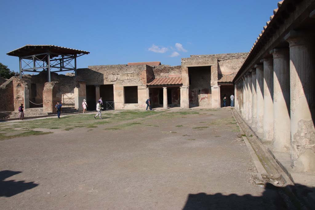 VII.1.8 Pompeii. September 2017. Looking towards north portico across palaestra, along east side, on right. 
Photo courtesy of Klaus Heese.