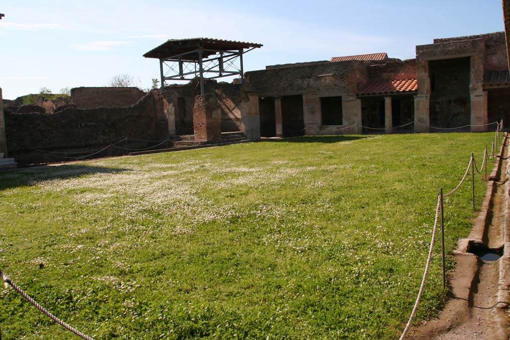 VII.1.8 Pompeii. April 2013. Looking north-west across palaestra, along east side, on right. 
Photo courtesy of Klaus Heese.