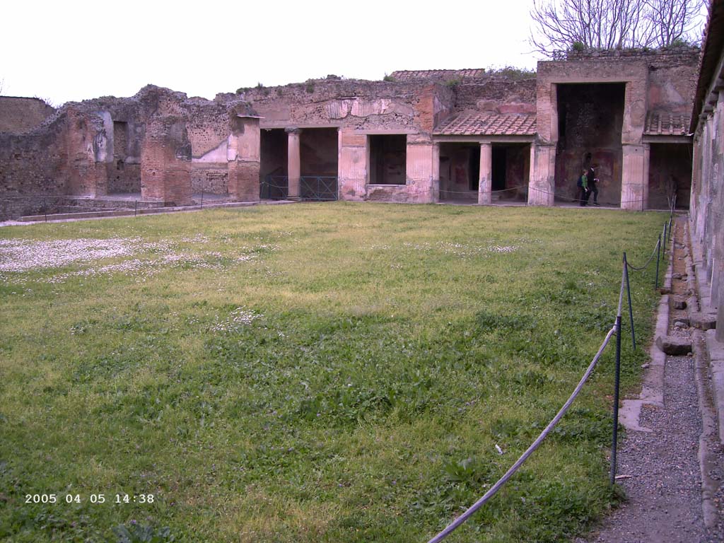 VII.1.8 Pompeii. April 2005. Looking towards north portico across palaestra, along east side, on right. 
Photo courtesy of Klaus Heese.