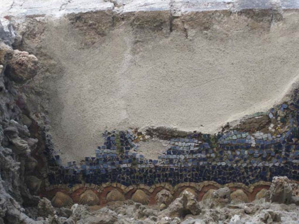 VII.1.8 Pompeii. July 2012. Nymphaeum G, west wall, detail from south end of mosaic at top of niche.  Photo courtesy of Sharon M. Wolf.