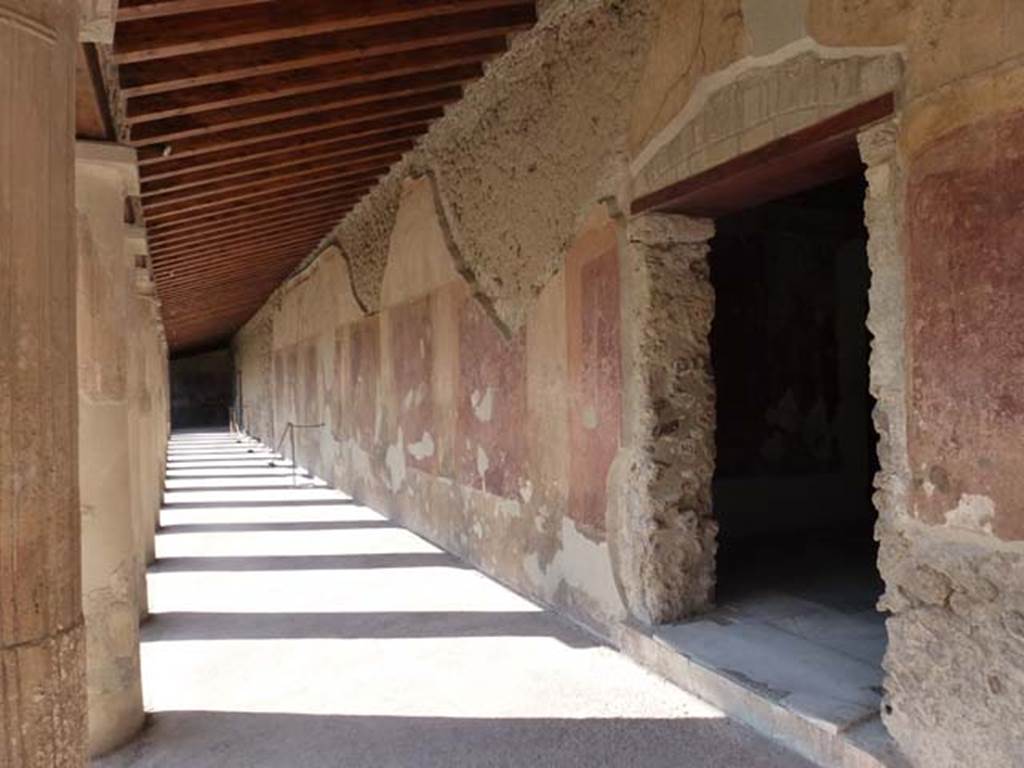 VII.1.8 Pompeii. June 2012. Corridor on east side of portico B, looking north. Photo courtesy of Michael Binns.