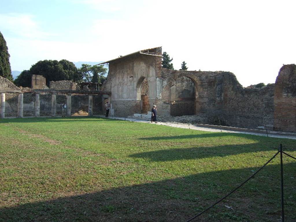 VII.1.8 Pompeii. September 2005. 
Looking across gymnasium C towards south side of portico B and west side of baths, from north-east corner.