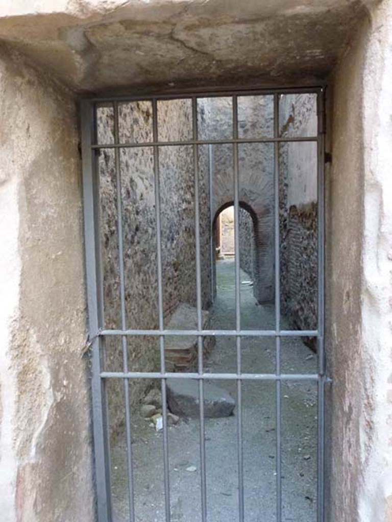 VII.1.14 looking towards VII.1.15 through gated doorway. June 2012.  Photo courtesy of Michael Binns.