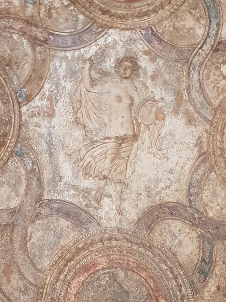 VII.1.8 Pompeii. October 2022.  
Maenad from the ceiling on north side of vestibule 1, near the men’s changing room. 
Photo courtesy of Klaus Heese.