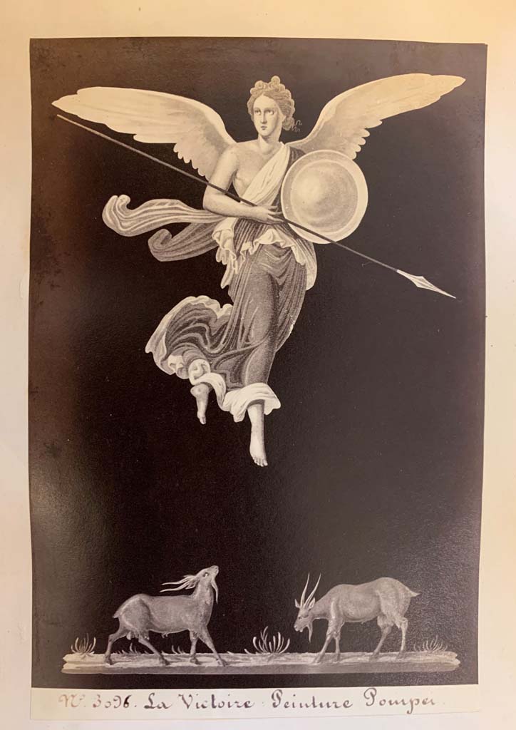 VII.1.25 Pompeii. Peristyle 31. An armed Victory in flight and frieze portraying goats.
From an album of Michele Amodio dated 1874, entitled “Pompei, destroyed on 23 November 79, discovered in 1745”. 
Photo courtesy of Rick Bauer.