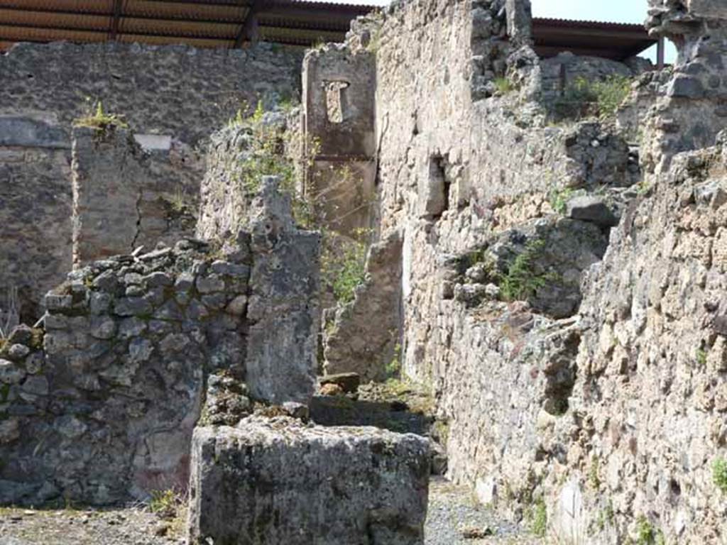 VII.1.27 Pompeii. May 2010. Looking west along corridor towards site of second latrine under stairs to upper floor. See Pappalardo, U., 2001. La Descrizione di Pompei per Giuseppe Fiorelli (1875). Napoli: Massa Editore. (p. 76)