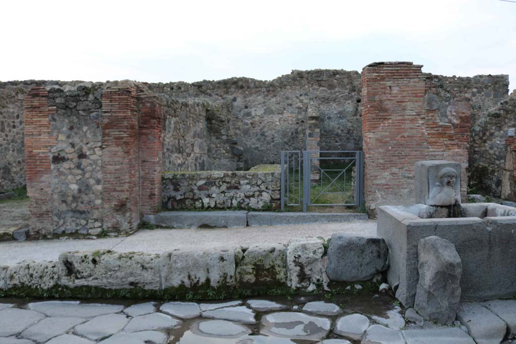 VII.1.32 Pompeii. December 2018. Entrance doorway on west side of Via Stabiana. Photo courtesy of Aude Durand.