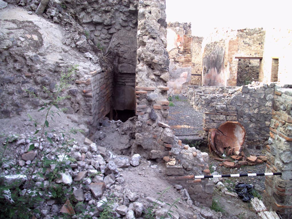 VII.1.36 Pompeii. August 2008.  
Looking north towards oven, and across atrium towards entrance corridor. Photo courtesy of Jared Benton.