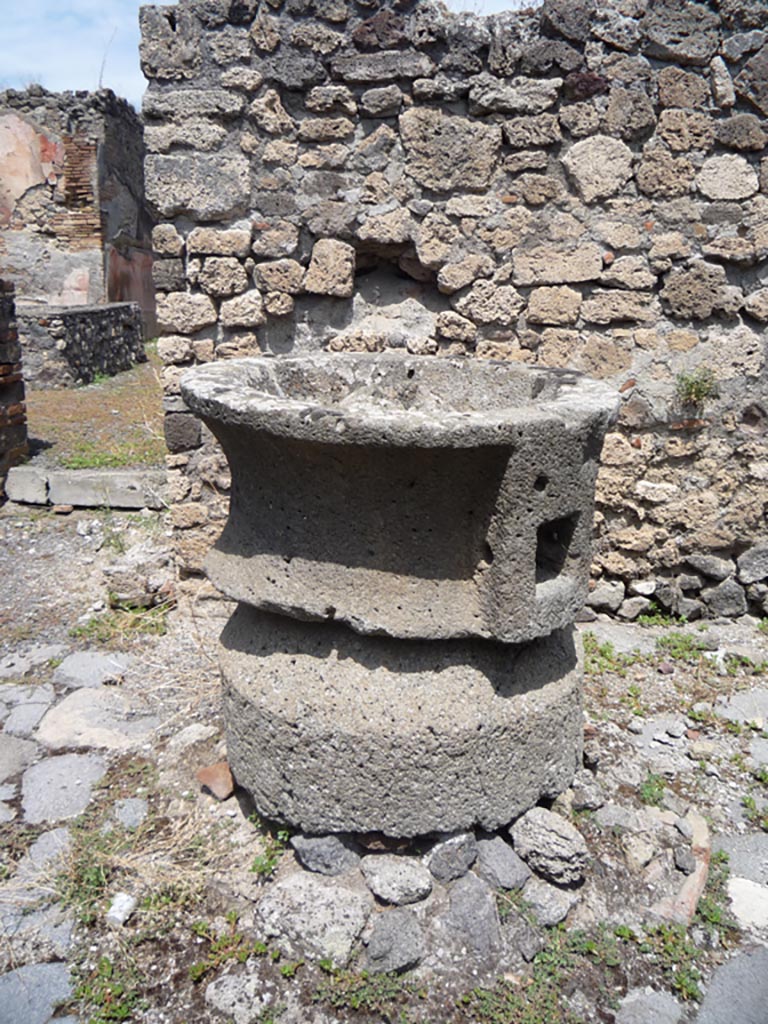 VII.1.36 Pompeii. October 2009. 
Looking north in south-east corner of bakery, with doorway to atrium, on left. Photo courtesy of Jared Benton.