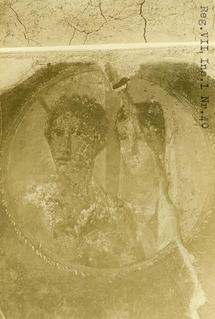 VII.1.40 Pompeii. Pre-1937-39. 
Medallion from west wall of atrium, found on the pilaster between the two cubicula in the north-west corner.  
Photo courtesy of American Academy in Rome, Photographic Archive. Warsher collection no. 1681.