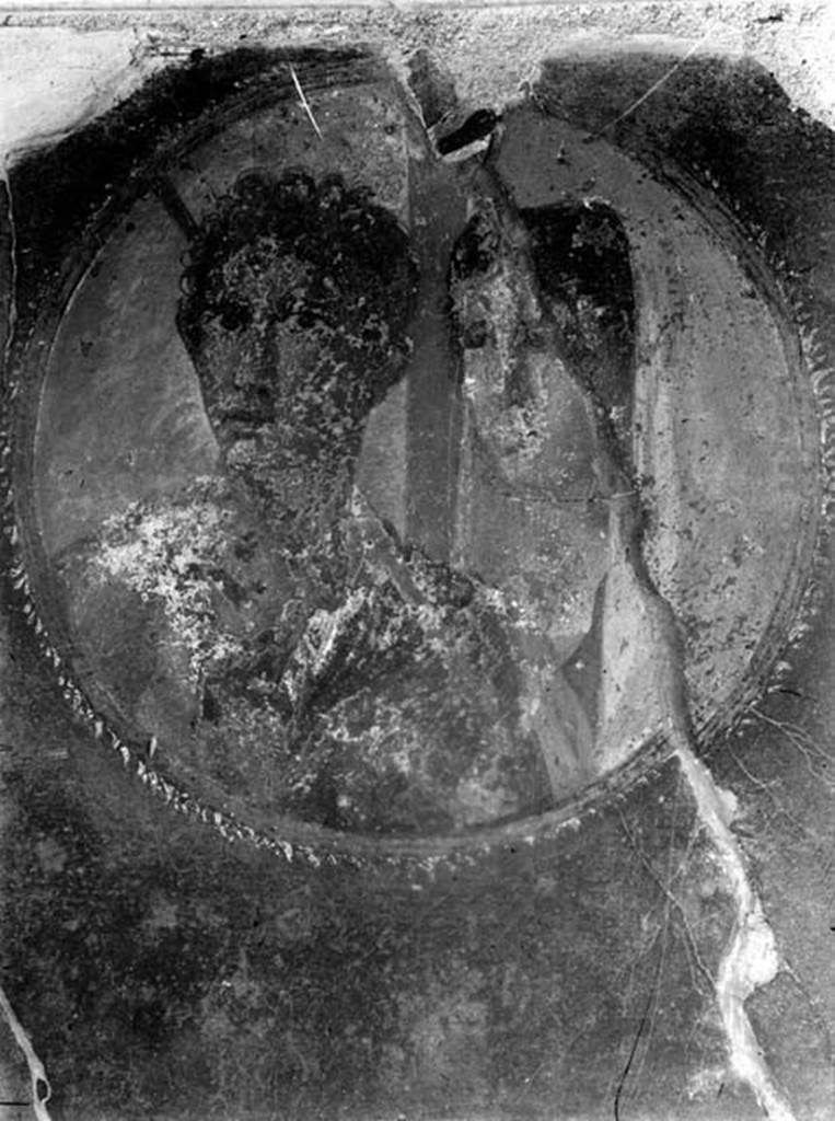 231871 Bestand-D-DAI-ROM-W.1413.jpg
VII.1.40 Pompeii. W.1413. Medallion from west wall of atrium, found on the pilaster between the two cubicula in the north-west corner.  Wall painting of medallion with heads of a couple, or perhaps Hippolytus and Phaedra or Aphroditeand Ares, according to Schefold & Helbig.
See Schefold, K., 1962. Vergessenes Pompeji. Bern: Francke. (tav.180, 2)
See Helbig, W., 1868. Wandgemälde der vom Vesuv verschütteten Städte Campaniens. Leipzig: Breitkopf und Härtel. (1247)
Photo by Tatiana Warscher. With kind permission of DAI Rome, whose copyright it remains. 
See http://arachne.uni-koeln.de/item/marbilderbestand/231871