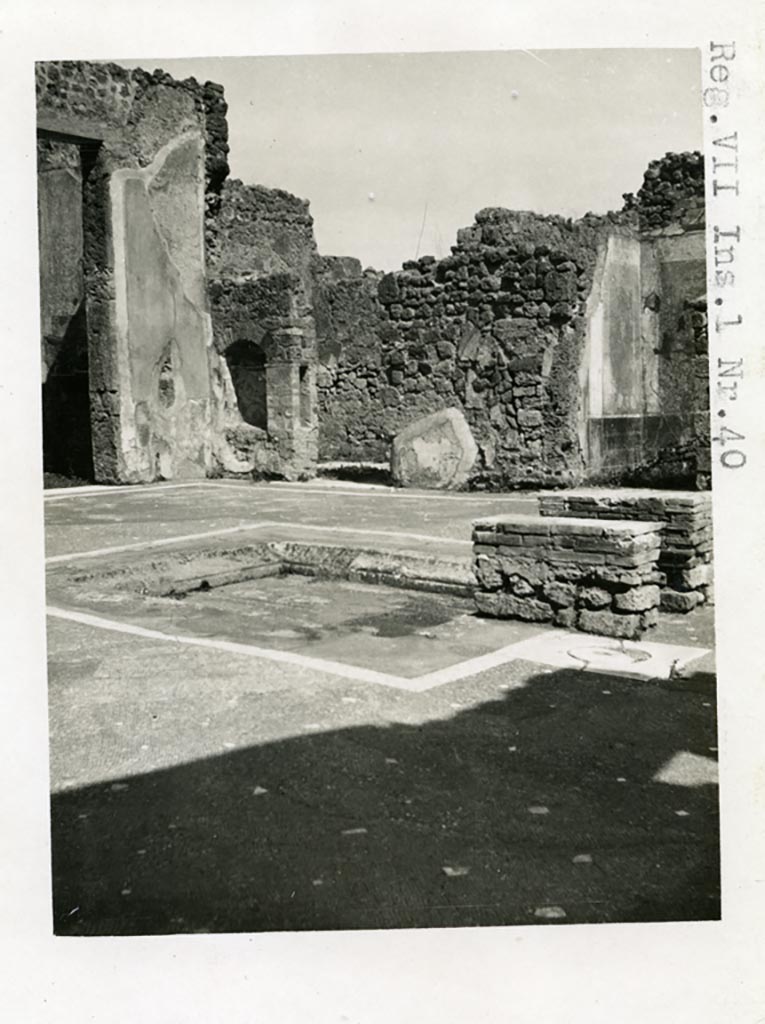 VII.1.40 Pompeii. Pre-1937-39. Looking across impluvium in atrium towards north-east corner.
On the left is the doorway to room 6, in the centre is the doorway to room 8, on the right is room 7.
Photo courtesy of American Academy in Rome, Photographic Archive. Warsher collection no. 1754.
According to Espen B. Andersson (email) there were taps once placed under the table photographed by Warscher.