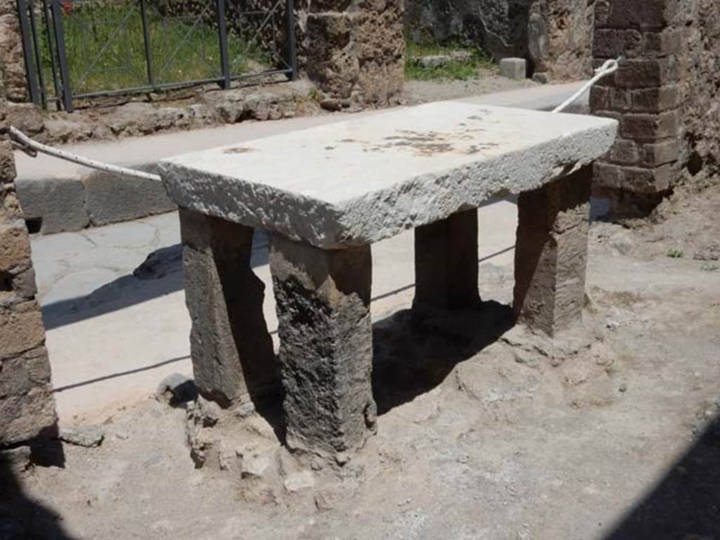 VII.1.42 Pompeii. May 2017. Looking towards table and entrance at VII.1.41. Photo courtesy of Buzz Ferebee.