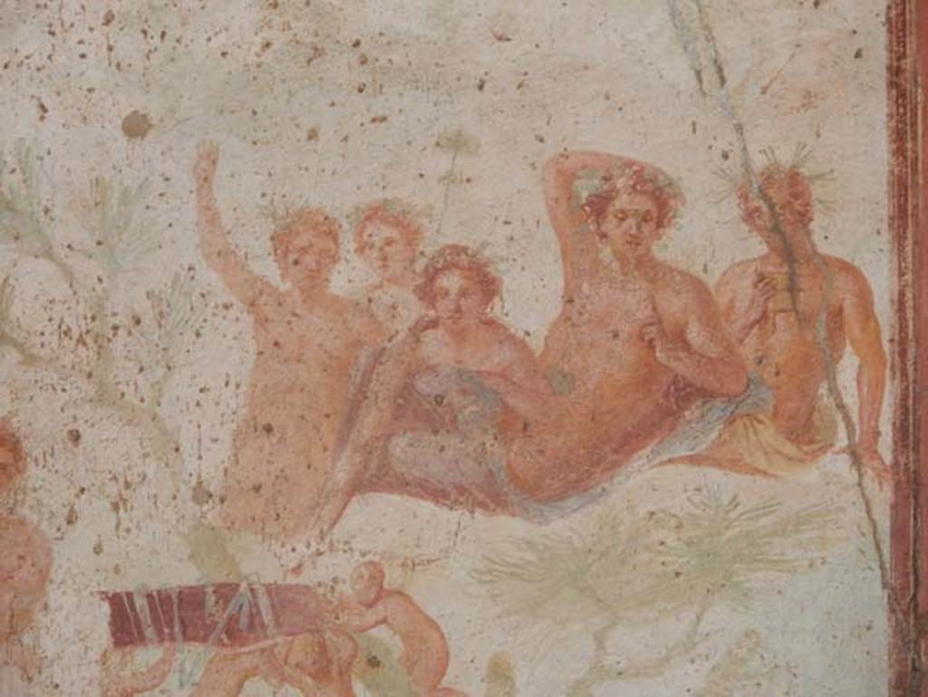 VII.1.47 Pompeii. May 2017. Exedra 10, detail from central painting on north wall.
On the right, half way up a mountain, sits Bacchus, surrounded by his attendants.  
Photo courtesy of Buzz Ferebee.