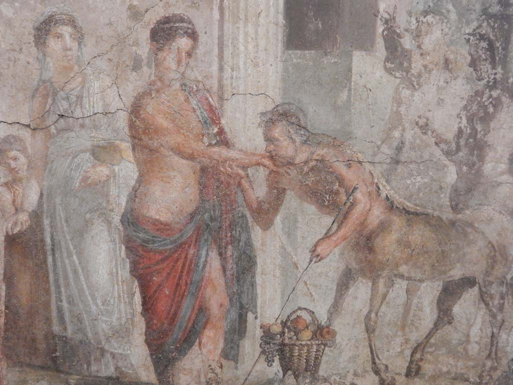 VII.2.16 Pompeii. June 2019. Room 17, detail from painting on west wall of exedra.  
Pirithous receiving homage from a centaur. Photo courtesy of Buzz Ferebee.