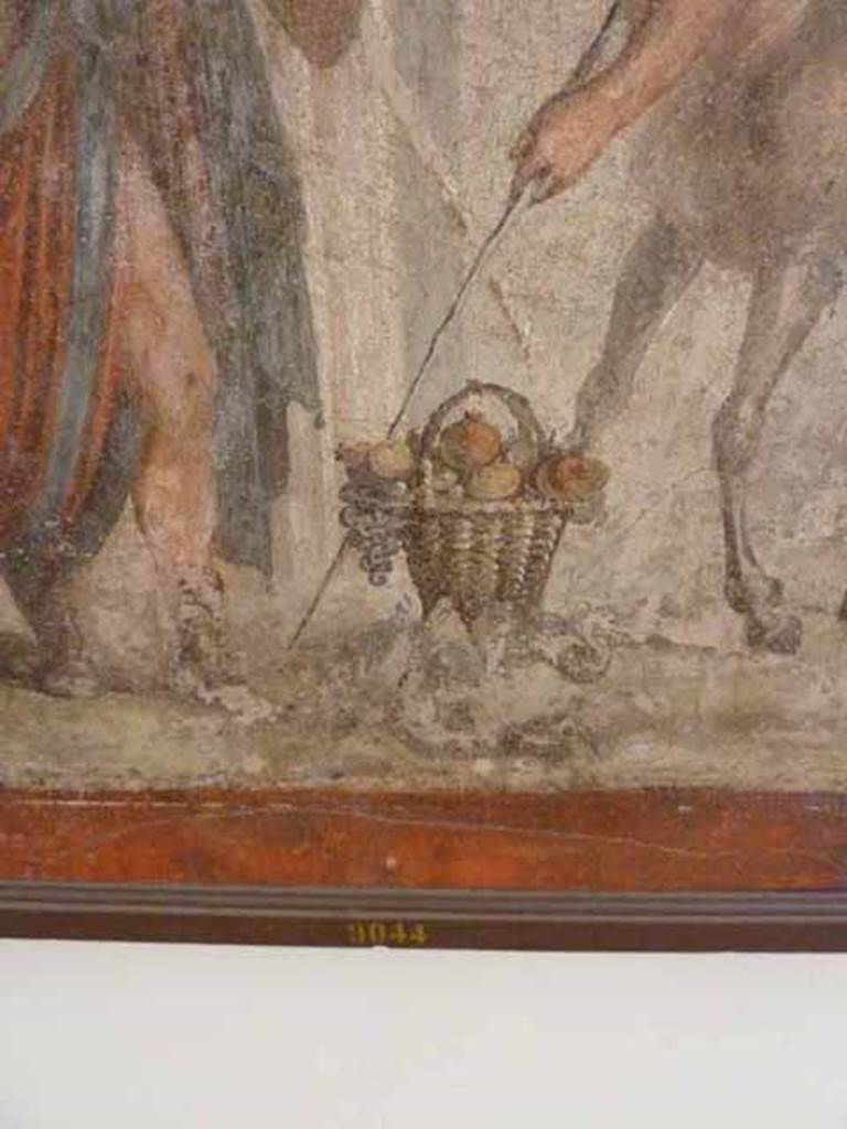 VII.2.16 Pompeii. Room 17, detail from painting on west wall of exedra.  
The basket of fruit brought as a gift.