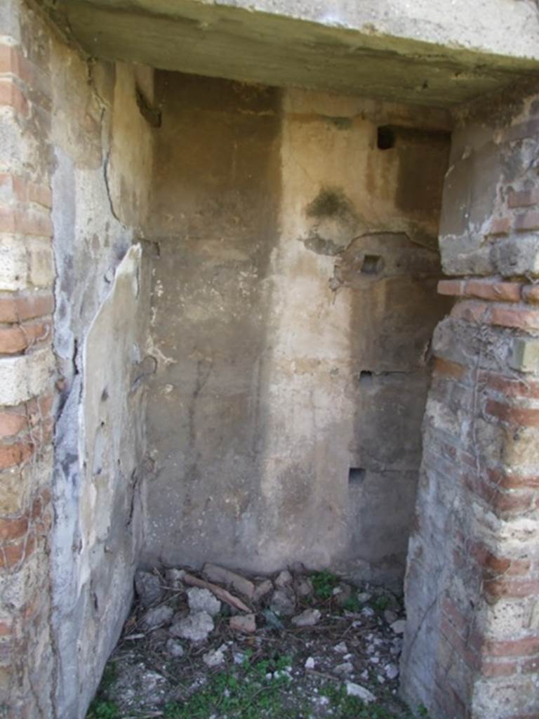 VII.2.18 Pompeii. March 2009. Room 16, south wall of small room or cupboard, with shelving supports.