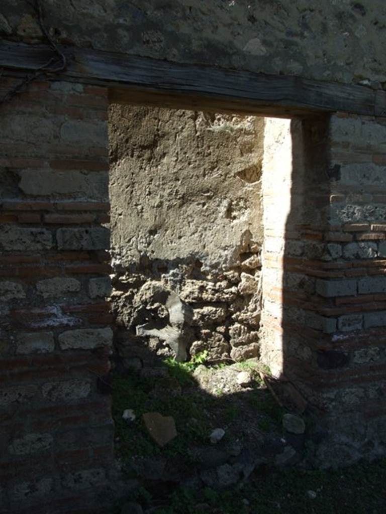 VII.2.18 Pompeii. March 2009. Room 20, small room in west wall of portico. 
According to Boyce, this recess had been variously called a sacrario or an armadio.  He thought it was certainly an armadio (cupboard).