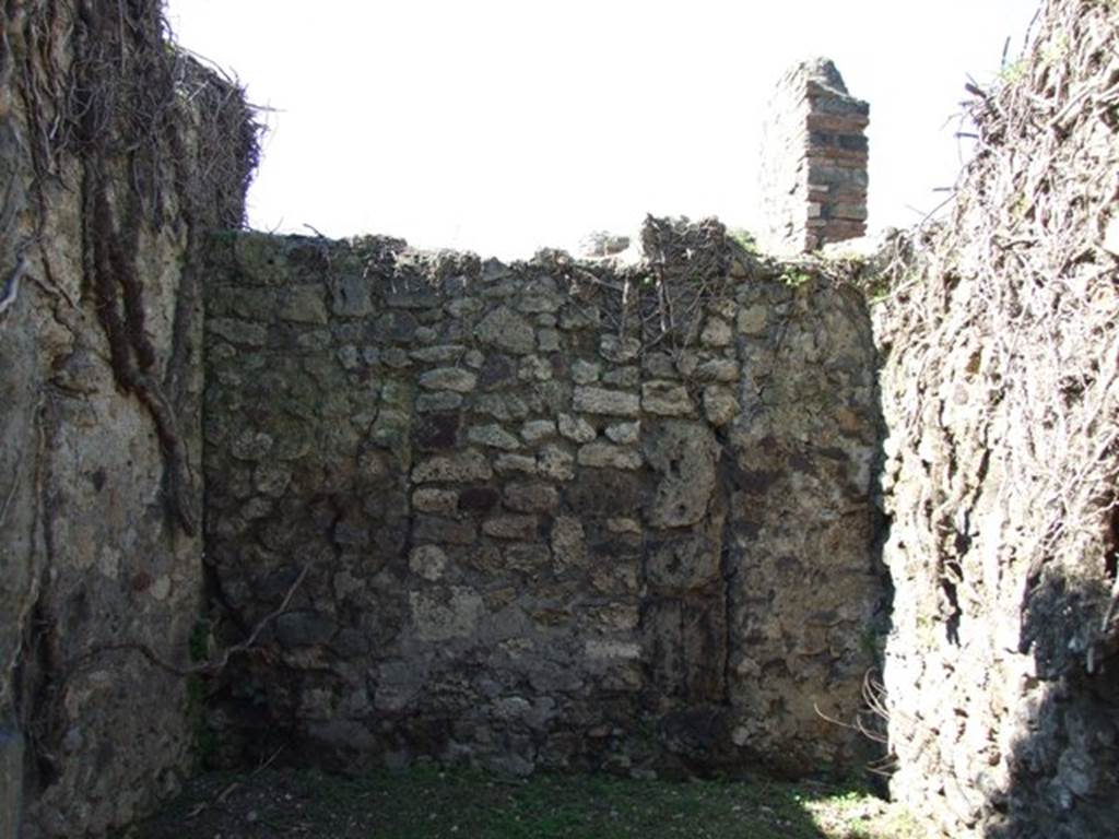 VII.2.20 Pompeii. March 2009. Room 19, west wall of cubiculum, with blocked doorway to neighbouring bakery.