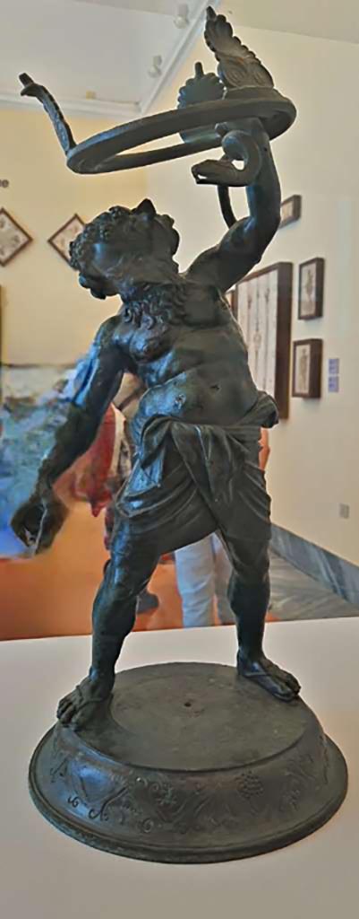 VII.2.20 Pompeii. October 2023.
Bronze statuette of Drunken Silenus. Photo courtesy of Giuseppe Ciaramella. 
On display in “L’altra MANN” exhibition, October 2023, at Naples Archaeological Museum, inv. 5001.