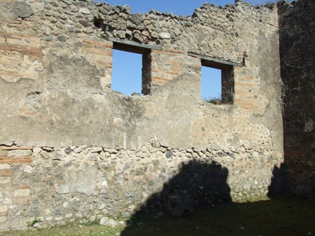 VII.2.20 Pompeii. March 2009.  Room 2, north wall of triclinium with windows onto Vicolo del Panettiere.