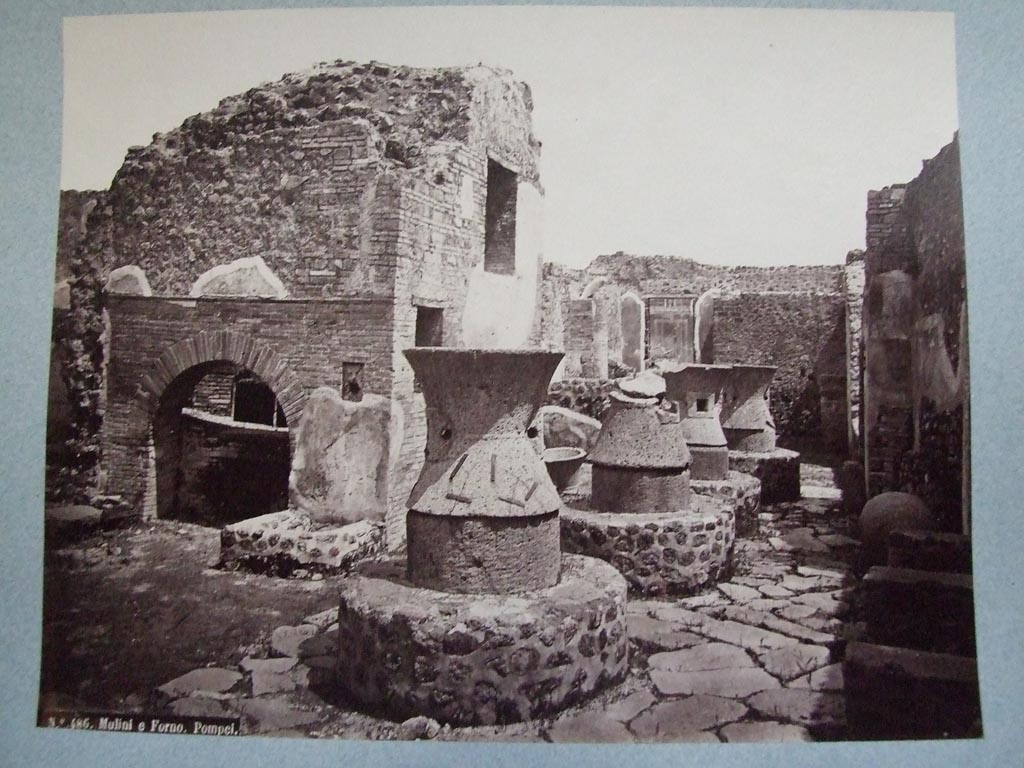 VII.2.22 Pompeii. Bakery of Popidius Priscus. Oven and mills. Old undated photograph. 
Courtesy of Society of Antiquaries. Fox Collection.