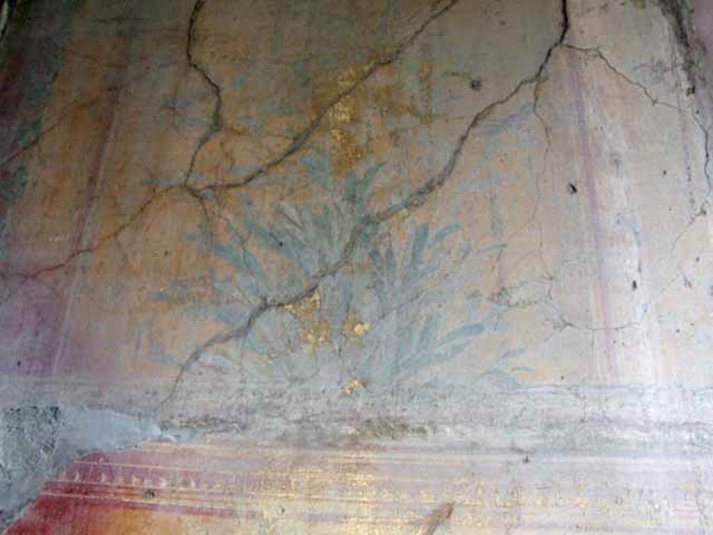 VII.2.25 Pompeii. March 2009. Viridarium, upper zone of east end of south wall. 
Painting of plant and bird.