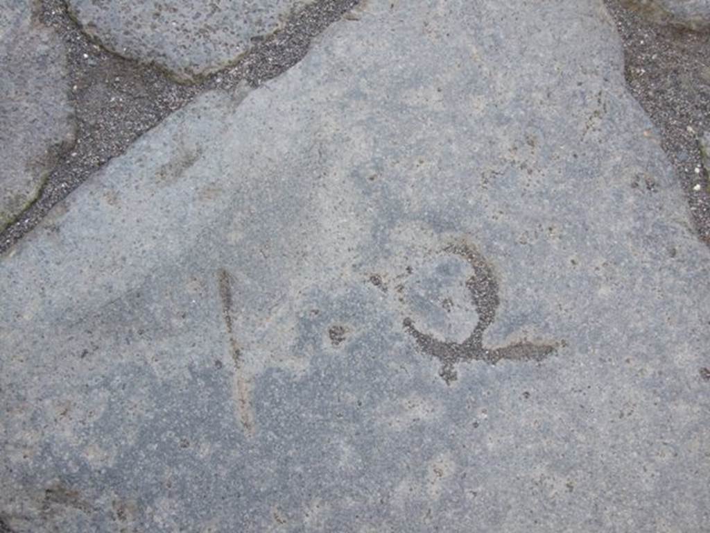 December 2007. Inscription K.Q. in Vicolo Storto outside VII.2.28. 
K.Q is Kalendis Quintilibus (July 1st).  According to Mau this apparently relates to the laying of pavement and must go back before 44BC when the month QUINCTILUS was changed to IULIUS, our July. Pompeii was therefore paved before 44BC.
See Mau, A., 1907, translated by Kelsey F. W. Pompeii: Its Life and Art. New York: Macmillan. (p.228).