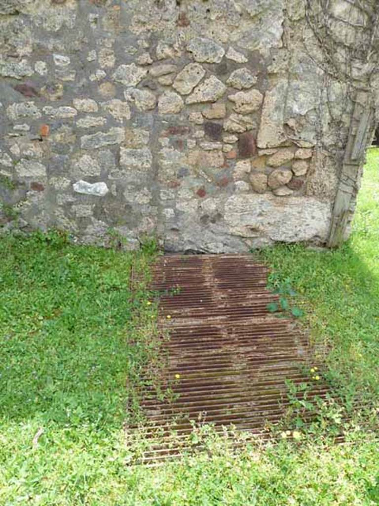 VII.2.35 Pompeii. May 2010. Entrance to cellar in south-east corner of atrium.